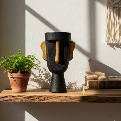 FLORERO ESCULTURA ÉTNICA EN NEGRO Y DORADO